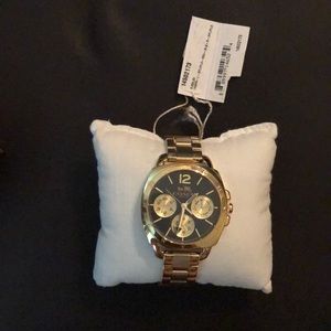 NWT Ladies’ Coach Gold Toned Black dial watch